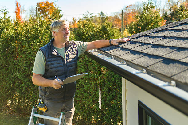 Professional Storm Damage Roof Repair technician working in Lee's Summit, MO